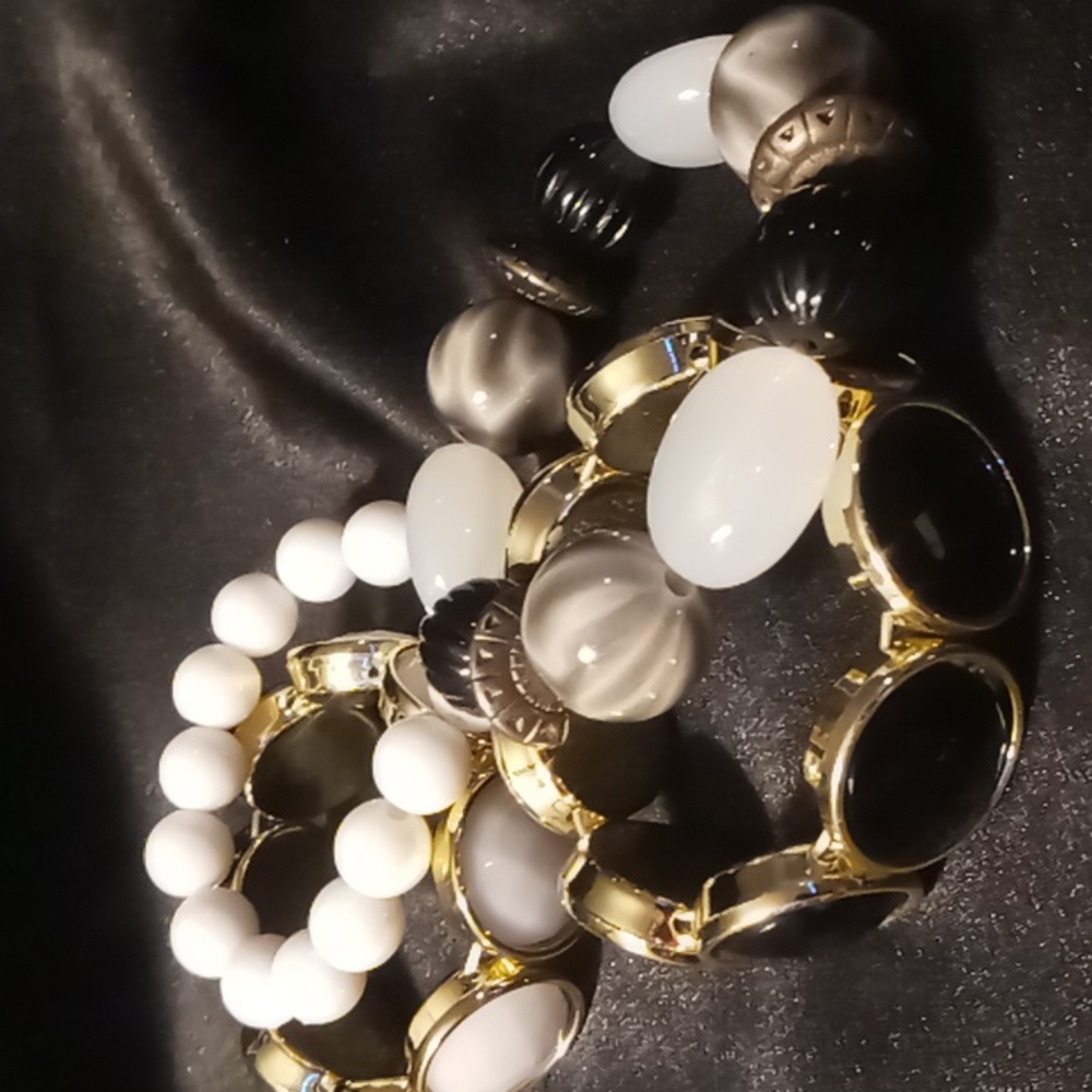 4 expandable Beaded bracelets black and whites crystal cut resin beaded .